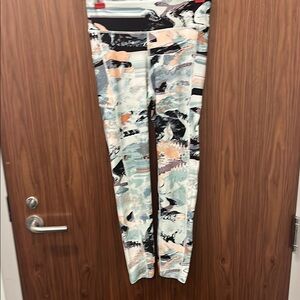 Women’s Under Armour Mid Rise Compression Leggings. small Blue Black Pink